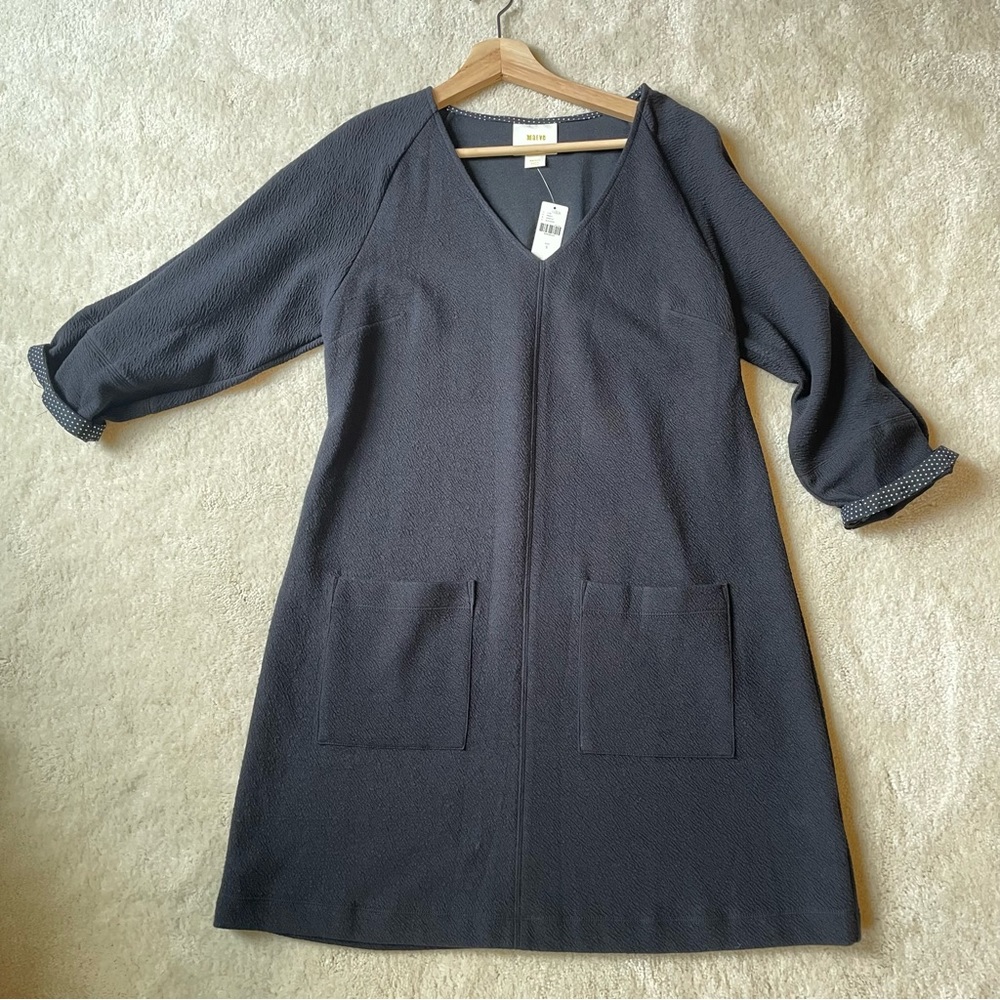 Black Maeve dress, 3/4 sleeves with 2 front pockets. Size small